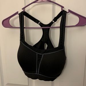 C9 black racer back duo dry sports bra 34C. Adjustable steps and closure.